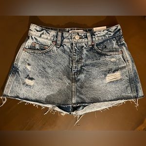 Denim mini skort. New with one tag, missing the hang tag.